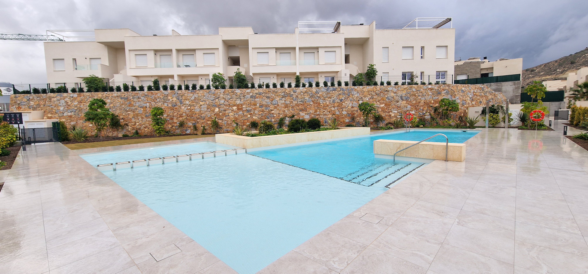 Modern and stylish, this partly furnished three-bedroom top-floor apartment with private solarium is